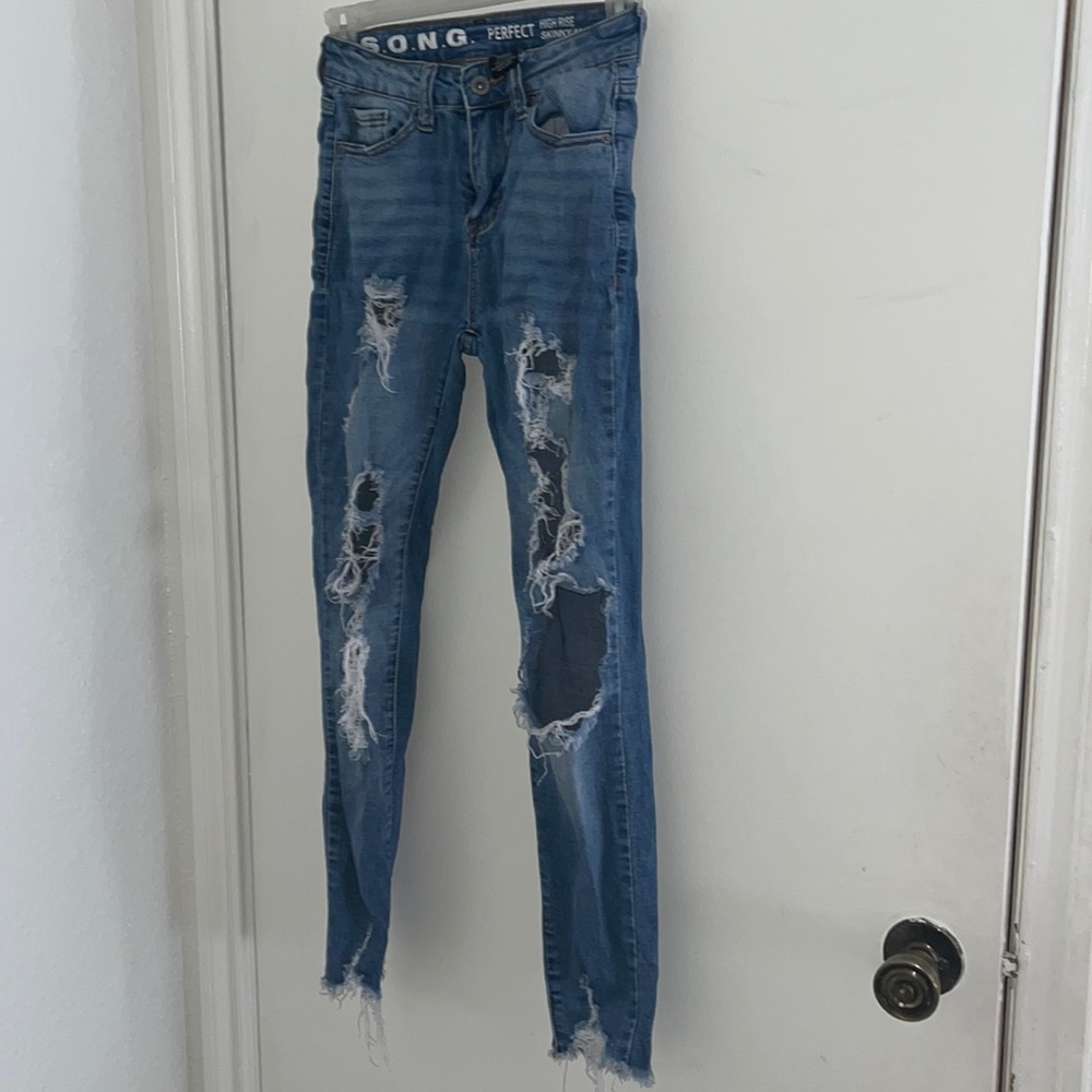 Ripped Blue Jeans